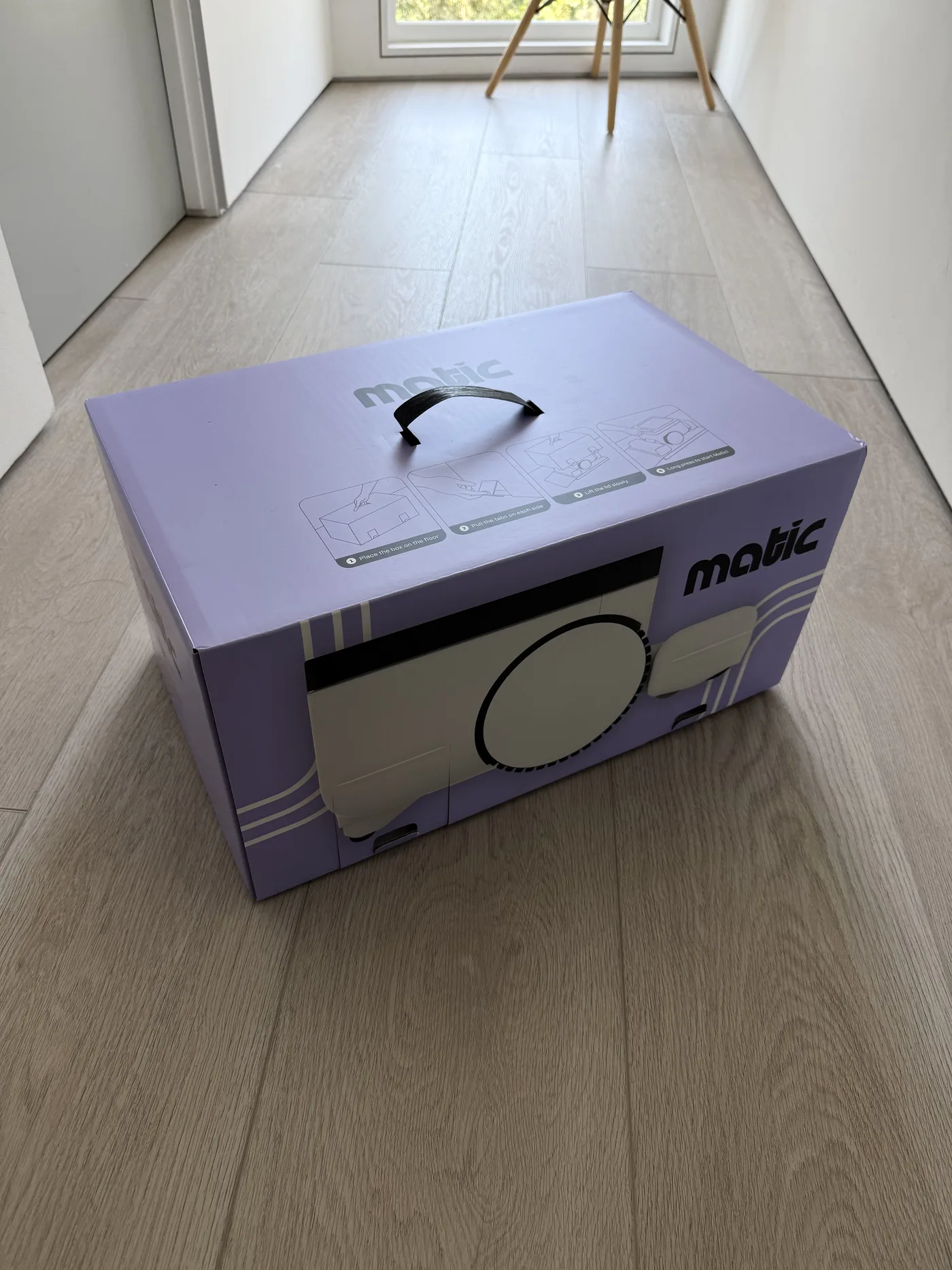 Matic robot vacuum packaging — distinctive lavender purple box with carry handle